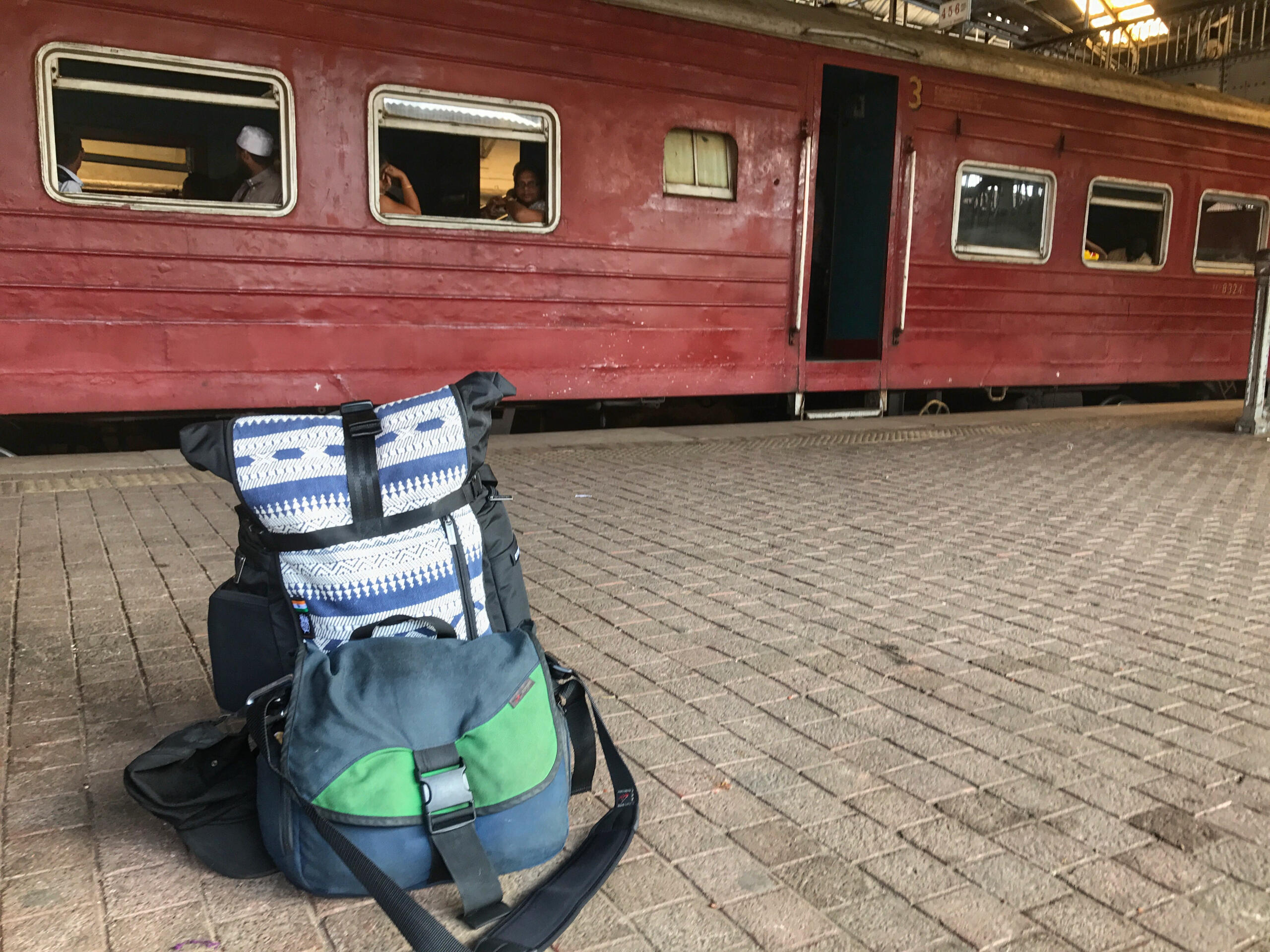 Bags in front of a train in Sri Lanka